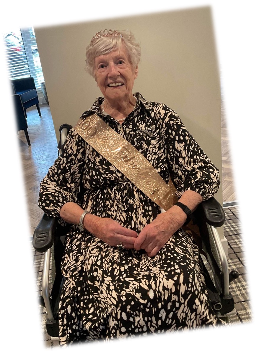 Resident Wearing Tiara & Sash for Her 100th Birthday